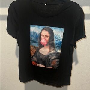 Pick 5 tee for $20

Black T-Shirt with Mona Lisa Graphic